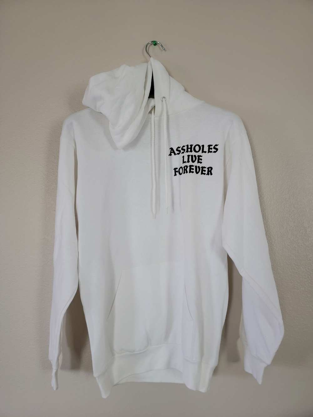 White Graphic Pullover Hoodie - "Assholes Live Forever"